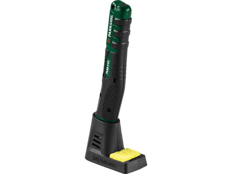 Saldatore a batteria nero e verde con base di ricarica e spugna.