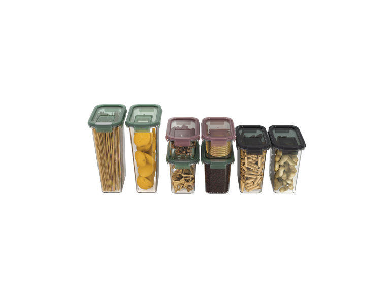 Set di contenitori trasparenti per alimenti secchi, inclusi pasta, biscotti e noci.