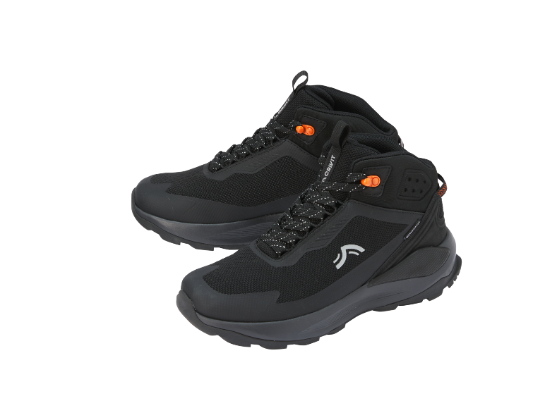 Un paio di scarponcini da trekking neri con accenti arancioni e lacci bianchi.