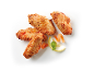 Alette di pollo fritte con limone, menta e striscioline di carota.