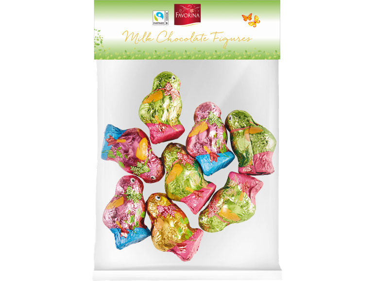 Statuette di cioccolato al latte a forma di uccelli, avvolte in carta stagnola colorata.