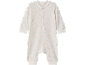 Tutina bianca per neonato con stampa a stelle beige e bottoni a pressione.