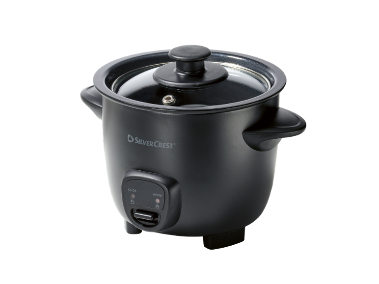 Cuociriso nero con coperchio trasparente e pannello di controllo con pulsanti «COOK» e «WARM».