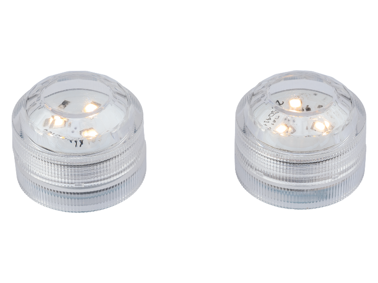 Due luci LED sommergibili trasparenti con luce bianca calda, ideali per decorazioni.