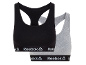 Due reggiseni sportivi in cotone, uno nero e uno grigio, con fascia elastica logata.