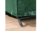 Telo di copertura verde con occhielli e coulisse, che copre i mobili su un pavimento in legno.