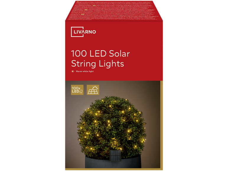 Catena luminosa solare da 100 LED con luce bianca calda, avvolta attorno a un cespuglio verde.