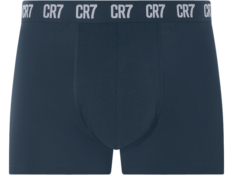 Boxer blu navy con elastico in vita e testo ripetuto.