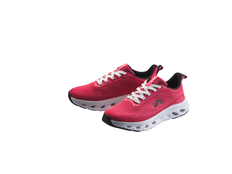 Un paio di scarpe da corsa rosse con lacci e suola bianca.