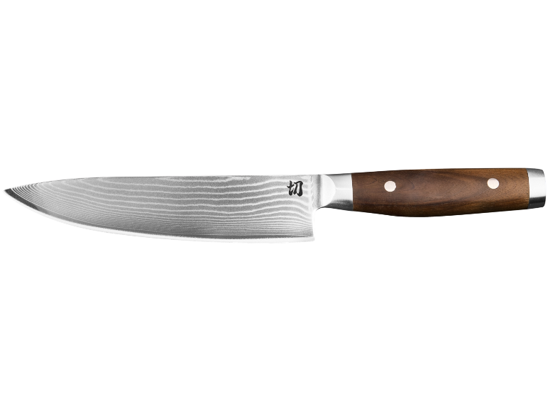 Coltello da cucina con lama a motivo ondulato e manico in legno marrone