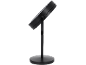 Specchio cosmetico nero con base rotonda e supporto regolabile.