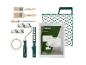 Kit pittura con pennelli, rulli, nastro adesivo e telo protettivo.