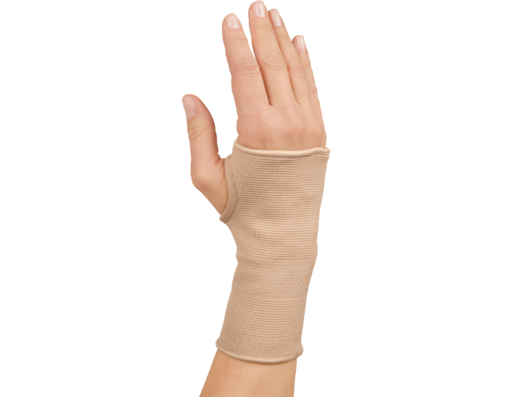 Tutore compressivo beige per il polso su una mano