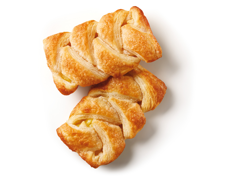 Treccine di pasta sfoglia dorate e zuccherate con ripieno di frutta.