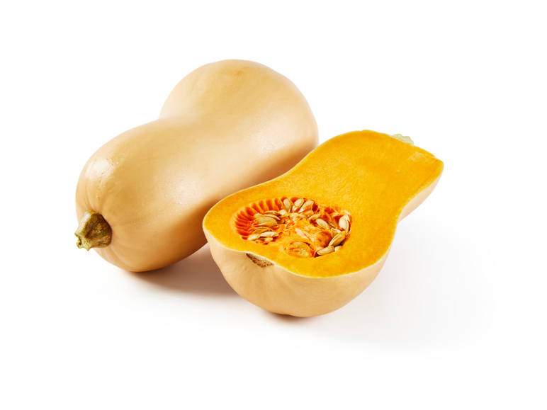 Zucca butternut intera e tagliata a metà con semi