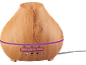 Diffusore di oli essenziali effetto legno con luce viola e timer 1h, 3h, 6h.