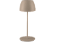 Una lampada da tavolo beige moderna e minimalista con paralume a cupola e base rotonda.