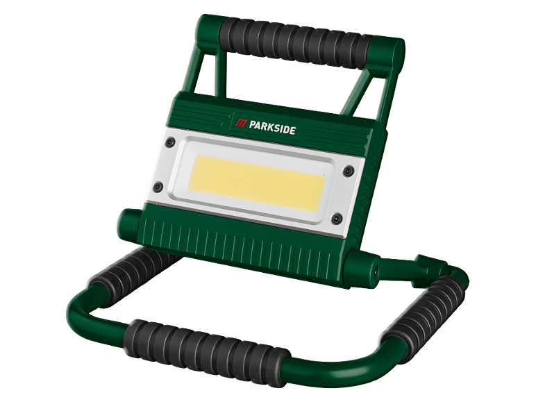 Faro da lavoro LED portatile verde con maniglie e supporto.