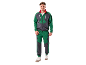Uomo in tuta verde e grigia con scritta 'PARKSIDE' e sneakers bianche.