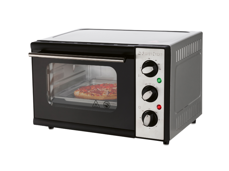 Mini forno compatto nero e argento con una pizza in cottura.