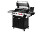 Barbecue a gas nero con coperchio aperto e manopole rosse