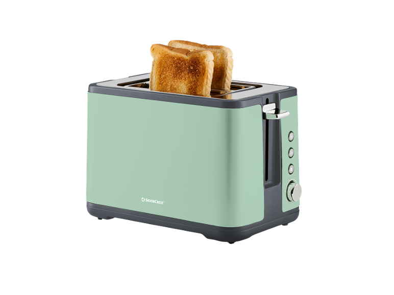 Tostapane verde menta con due fette di pane tostato.
