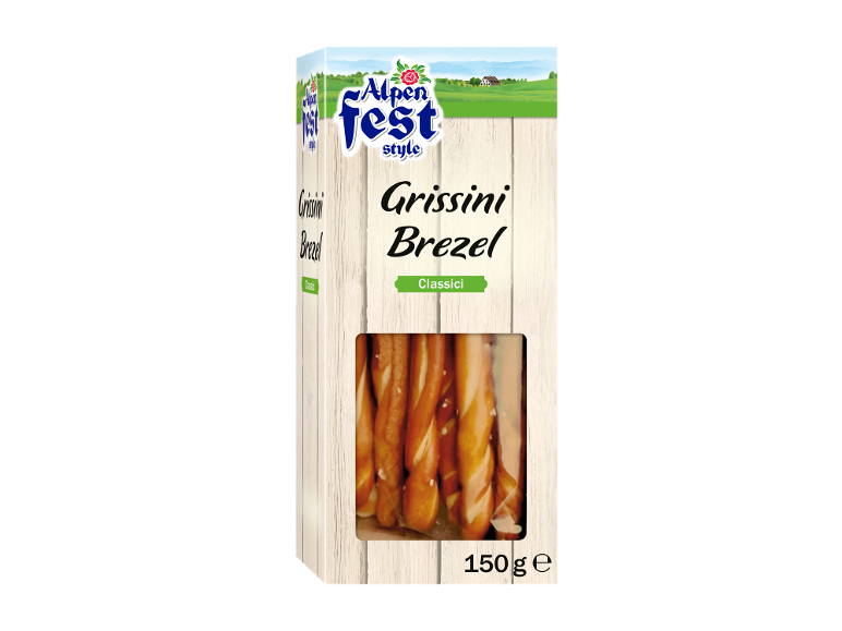 Confezione di grissini e pretzel classici con sfondo in legno e paesaggio.