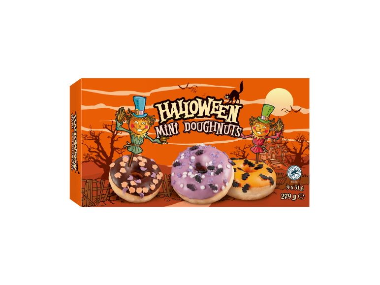 Scatola di mini ciambelle di Halloween con spaventapasseri e decorazioni spettrali.