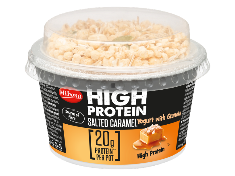 Yogurt proteico al caramello salato con granola in un vasetto.
