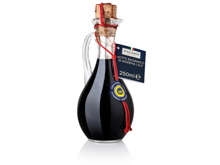 Bottiglia da 250 ml di aceto balsamico di Modena I.G.P. con tappo di sughero e cordino rosso.