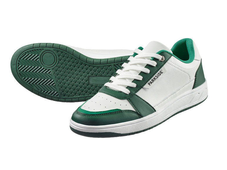 Sneakers bianche e verdi con lacci bianchi, suola verde testurizzata visibile.