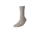 Calzino singolo beige chiaro su sfondo nero.