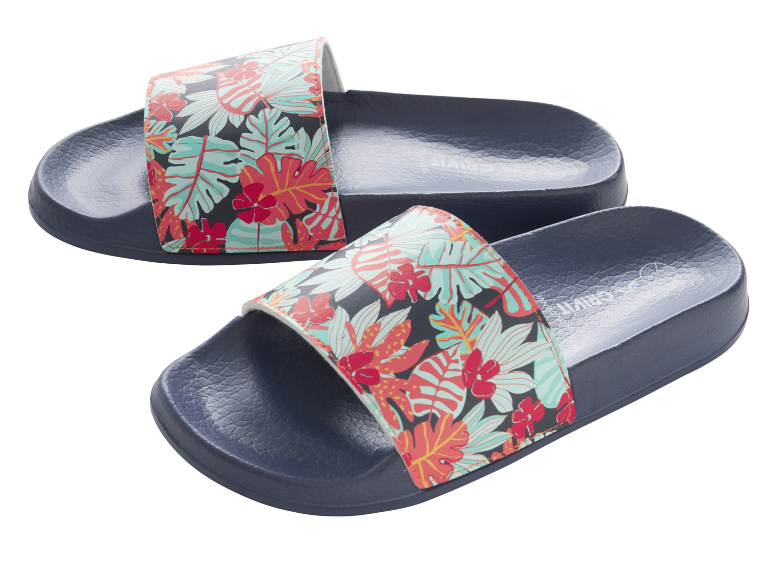 Ciabatte blu navy con vivace motivo floreale tropicale.