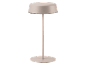 Lampada da tavolo beige con base e paralume rotondi.