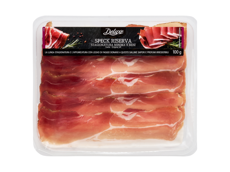 Vassoio di speck affumicato con etichetta 'Speck Riserva' e 100 g.
