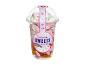 Mix di dolcetti unicorno: bicchiere trasparente con marshmallow bianchi, rosa e verdi e gelatina di frutta.