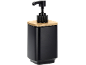 Dispenser di sapone nero opaco con pompa e coperchio in bambù.