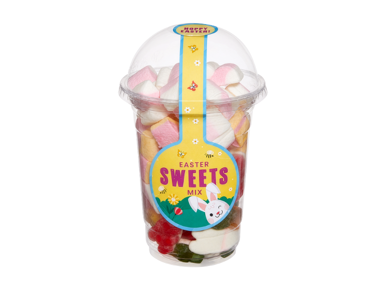 Bicchiere con marshmallow e caramelle gommose, con etichetta „Easter Sweets Mix“ e coniglietto.