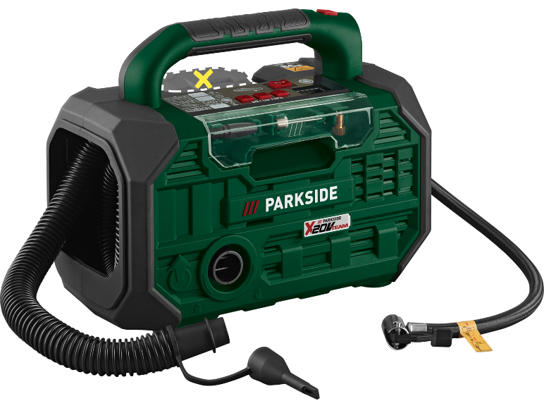 Compressore d'aria portatile verde e nero con tubi e ugelli su sfondo nero.