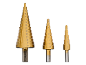 Set di tre punte a gradino dorate con misure marcate da 4 a 32 mm.
