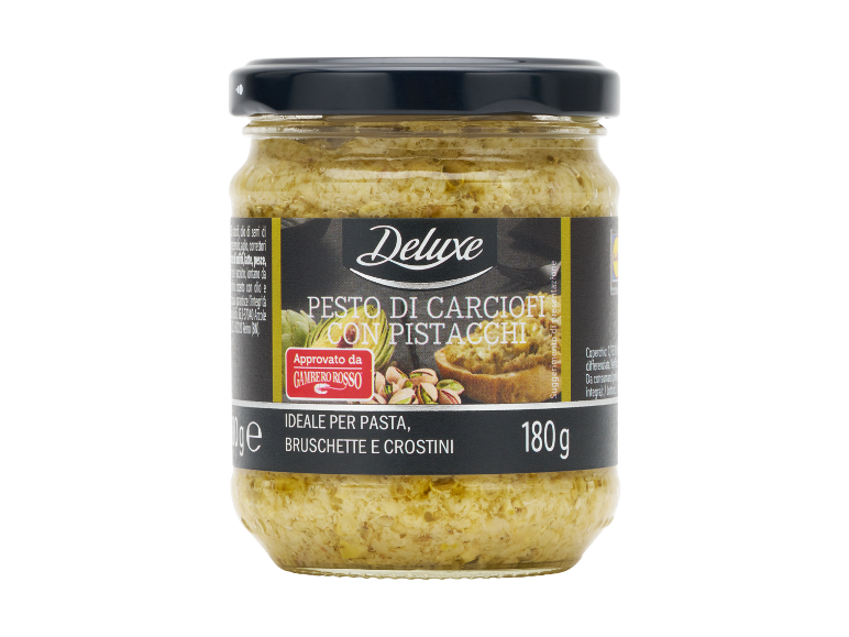 Pesto di carciofi con pistacchi in vasetto di vetro, ideale per pasta, bruschette e crostini.