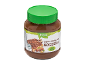 Vasetto di crema vegana alla nocciola con coperchio verde ed etichetta.