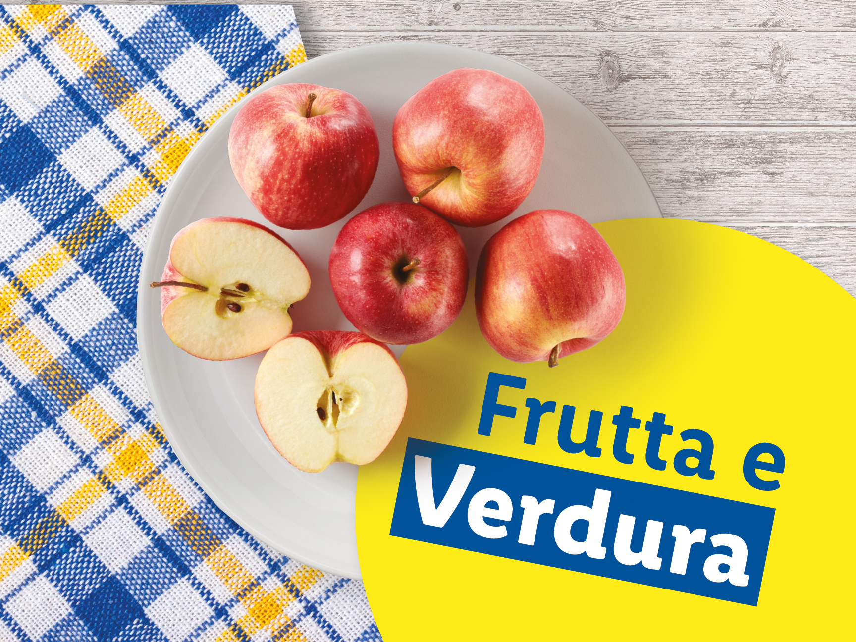 Mele rosse su un piatto con la scritta 'Frutta e Verdura'.
