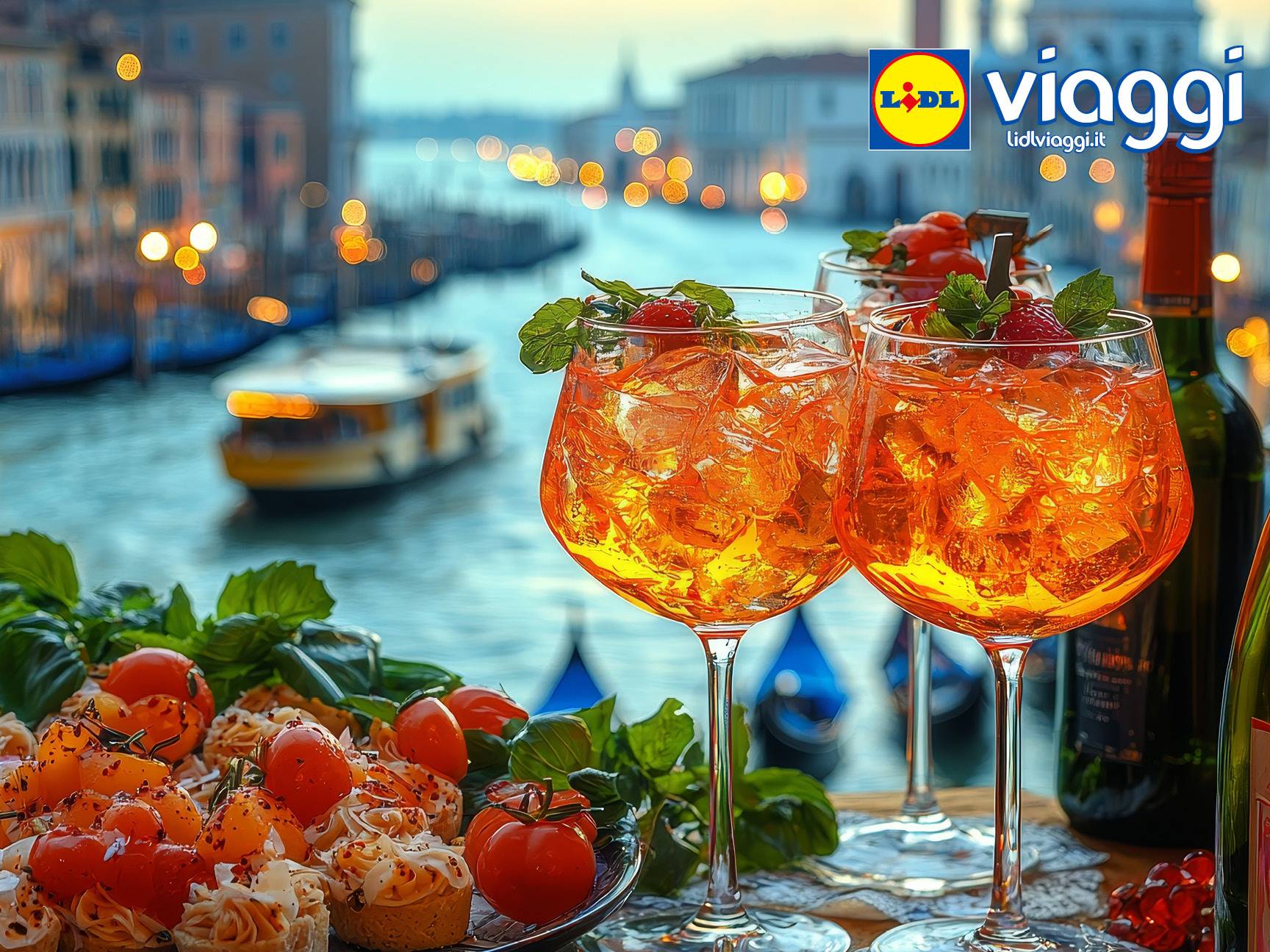 Due bicchieri di Spritz e stuzzichini con vista sul Canal Grande di Venezia.